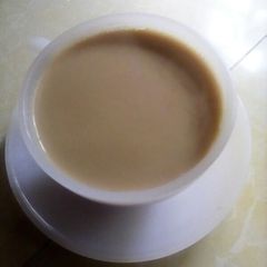 A picture of Ginger, black pepper, cardamom and cinnamon flavored tea.