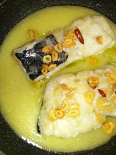 Una foto de Bacalao al pil-pil