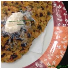 A picture of Indian Corn paratha with fresh fenugreek leaves.