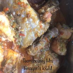 A picture of Okro soup with chicken and fish.