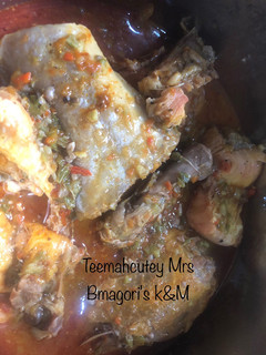 A picture of Okro soup with chicken and fish.