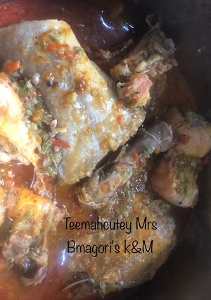A picture of Okro soup with chicken and fish.