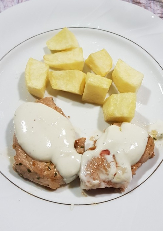 Una foto de Solomillo de cerdo con salsa de queso
