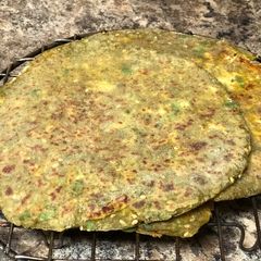 A picture of Panner stuffed Avocado paratha.