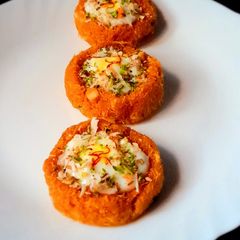 A picture of Kesar Pista Rabdi In Qiwami Seviyan Bowl.