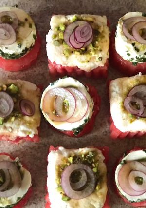 A picture of Watermelon feta cheese and soft cheese canapés.