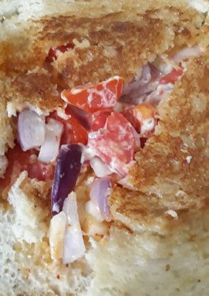 A picture of Tawa roasted Sandwich with mayonnaise.