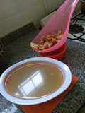Caldo de cogotes de pollo