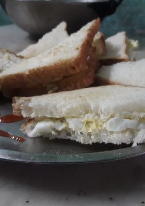 A picture of Boiled eggs and cheese sandwich.