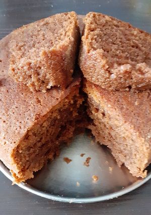 A picture of Eggless Whole wheat chocolate cake in cooker.