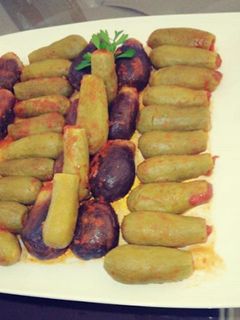 صورة لوصفة كوسا وباذنجان محشي بالتوابل الخضراء