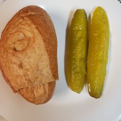 A picture of Cheeseburger stuffed Bolillo roll.