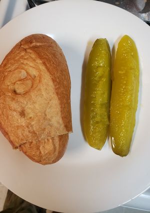 A picture of Cheeseburger stuffed Bolillo roll.