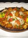 Rice sizzler with tomato coulis