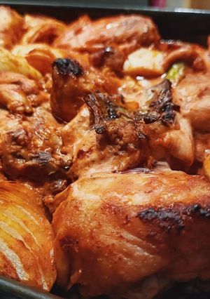 A picture of Chicken in oven.
