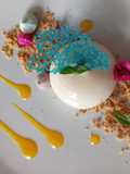 Panacotta de galleta María con coulis de mandarina