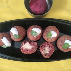 A picture of Beetroot Cheesy Poppers.
