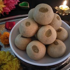 A picture of KANIK LADOO (SAAKHARECHE LAADOO/WHOLE WHEAT FLOUR LAADOO).