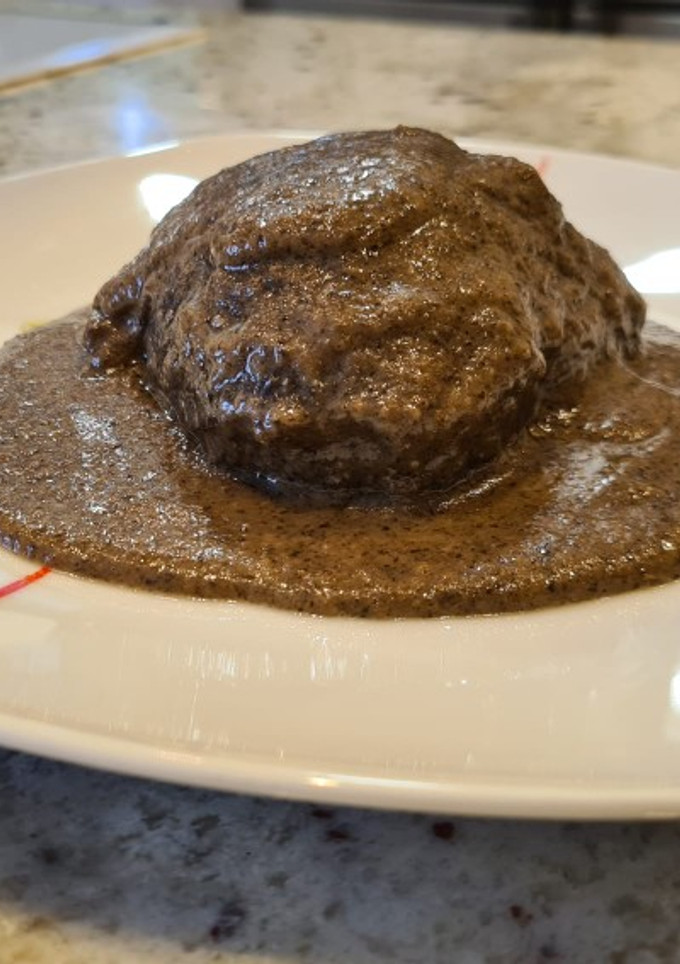 Una foto de Carrillera de ternera en salsa de champiñones y queso