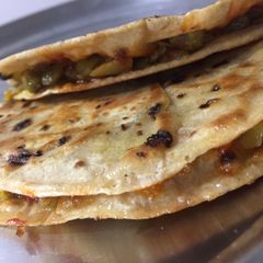 A picture of Yummy pizza tortilla.