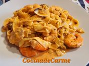 Una foto de pasta con almejas