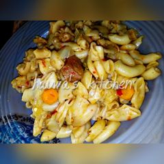 A picture of Macaroni with veggies.