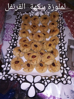 A picture of Ghriba Cookies with Almonds and Sesame, Clove-Flavored.