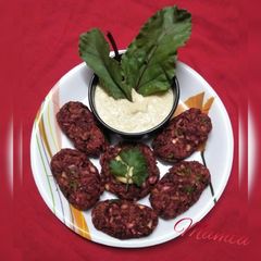 A picture of Baked Beetroot- Oatmeal kababs.(with tahini sauce).