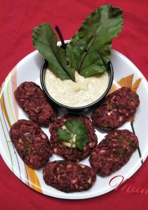 A picture of Baked Beetroot- Oatmeal kababs.(with tahini sauce).