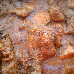 A picture of Chicken Chaap (Bengali style chicken in thick poppy paste).