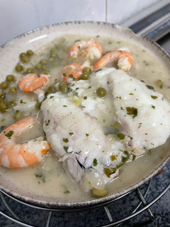 Una foto de Merluza en salsa verde