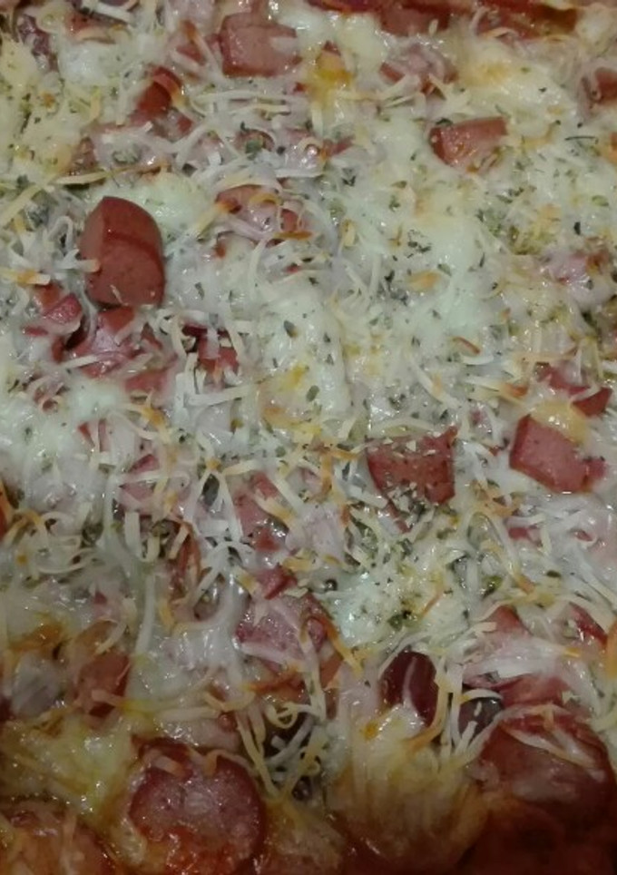 Una foto de Pizza de mar y tierra