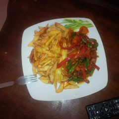 A picture of Irish petetoes with verges with beef.
