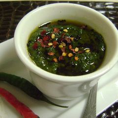 A picture of Kumro Pata Bata (Tender Pumpkin Leaves Chutney - Bengali Style).
