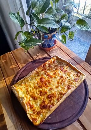 Una foto de Tarta de queso sardo y cebolla caramelizada