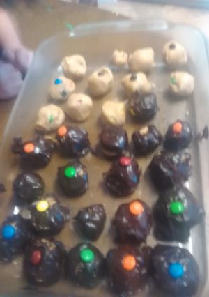 A picture of Chocolate covered peanut butter M&M balls.