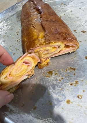 Una foto de Enrollado de Jamón y queso