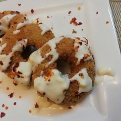 A picture of Chicken donuts with Cheese sauce.