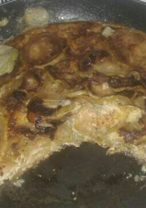 Una foto de Tortilla de zapallo succhini