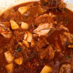 A picture of Potatoes in chicken pepper soup.