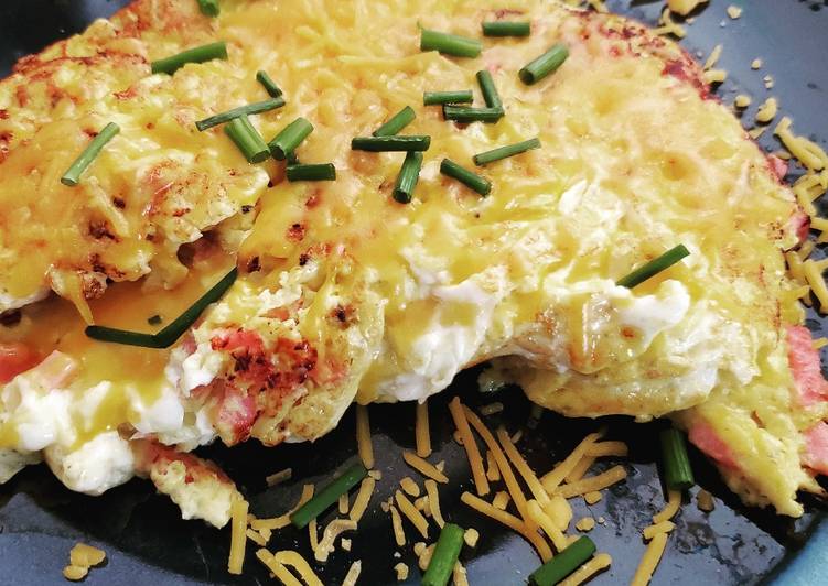 Recipe of Appetizing Sunday breakfast omelet with ham and cheese and chives