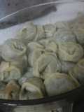 Cappelletti casero relleno de carne y espinaca