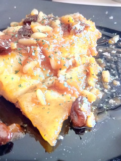 Una foto de Bacalao Frito a la Miel de Naranjo