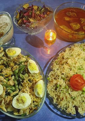 A picture of Chicken Degi Qorma and Martar (peas) Pulao one hour.