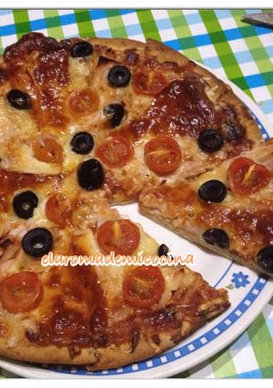 Una foto de Pizza Semicurada