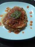 Huarache de frijol con filete de pescado en salsa de jitomate asado al tequila y salsa verde Geras