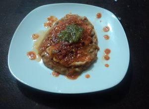 Foto principal de Huarache de frijol con filete de pescado en salsa de jitomate asado al tequila y salsa verde Geras