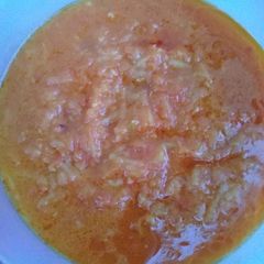 A picture of Tomato gravy with potato.