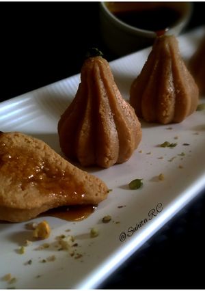 A picture of Nolen Gur er jolbhara sandesh (date palm jaggery sandesh).
