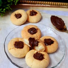 A picture of Butter Cookies with Nutella.